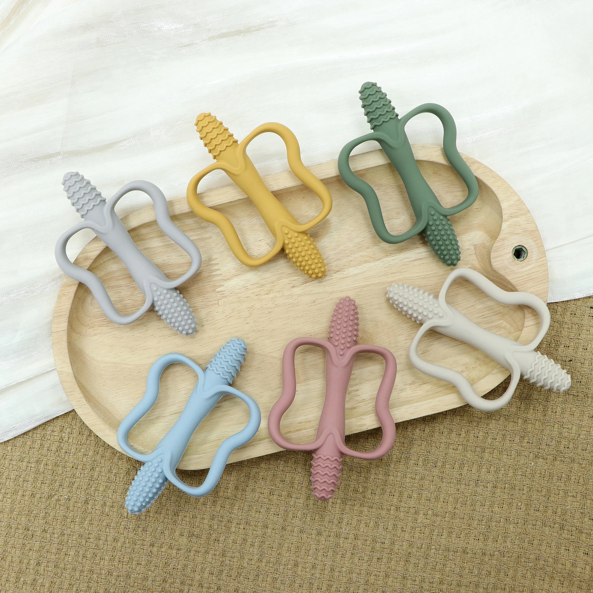 Integrated Silicone Teething Stick with Handle, Baby Toy Teether, Available in 6 Colors, Corn-Shaped Teether.