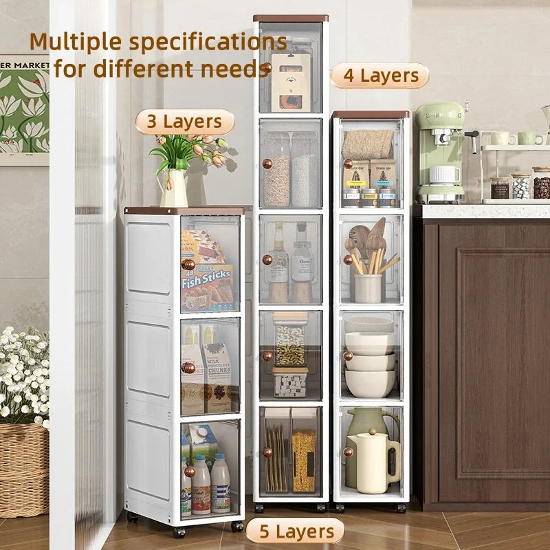 The transparent storage cabinet with wheels in the gap saves space in the kitchen and living room for storing snacks