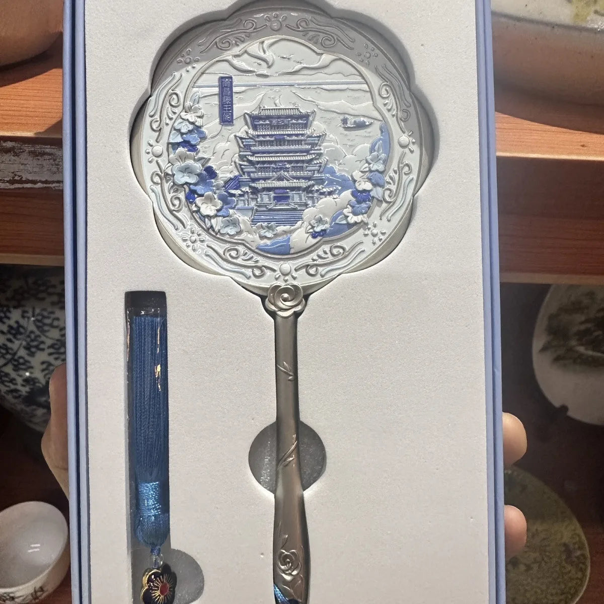 Handheld Relief Metal Mirror from Nanchang Tengwang Pavilion, a Chinese tourist souvenir