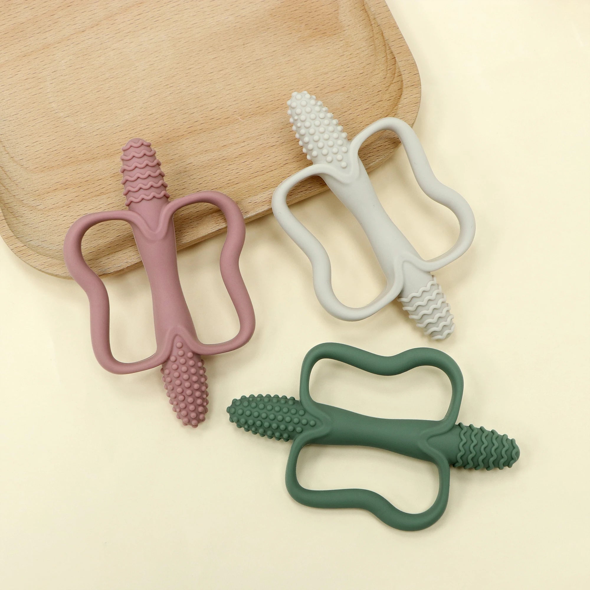 Integrated Silicone Teething Stick with Handle, Baby Toy Teether, Available in 6 Colors, Corn-Shaped Teether.