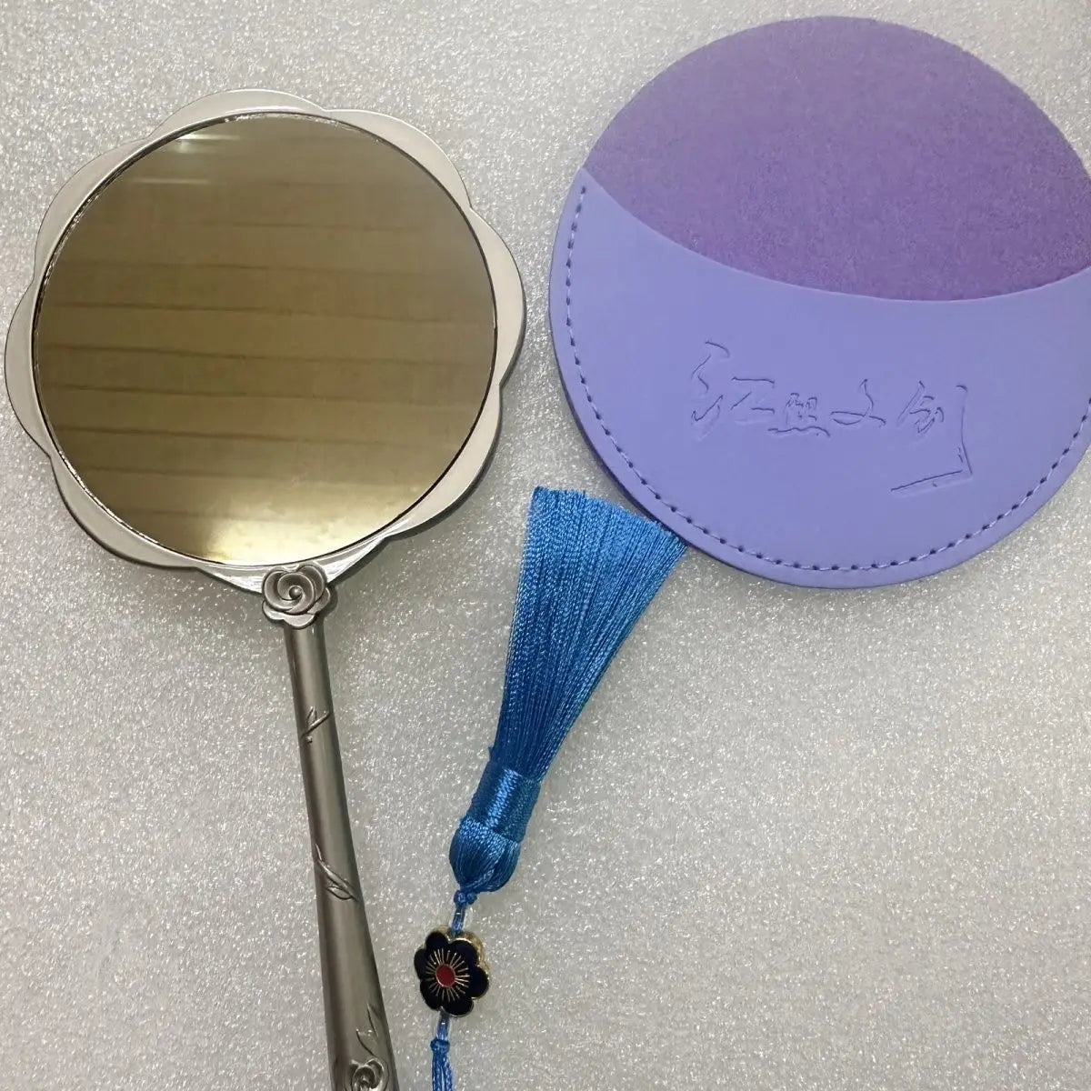 Handheld Relief Metal Mirror from Nanchang Tengwang Pavilion, a Chinese tourist souvenir