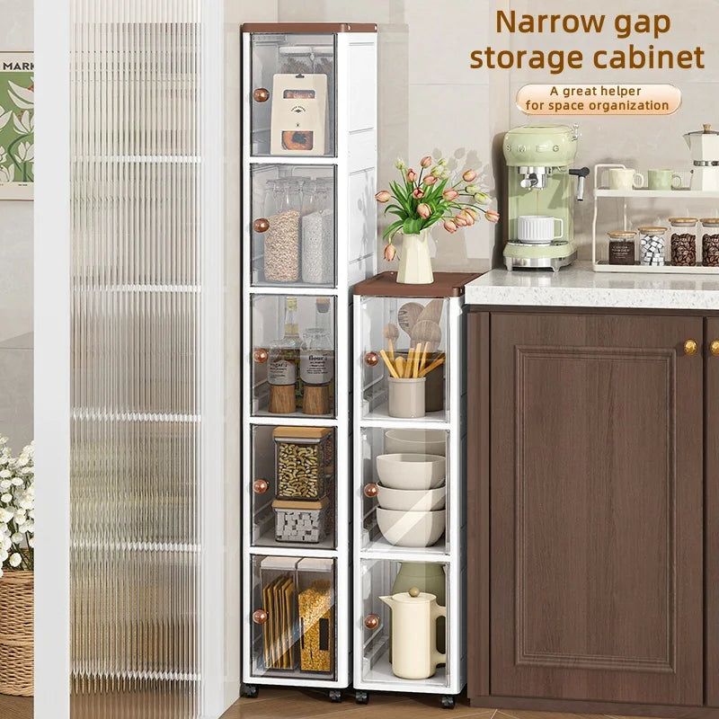 The transparent storage cabinet with wheels in the gap saves space in the kitchen and living room for storing snacks