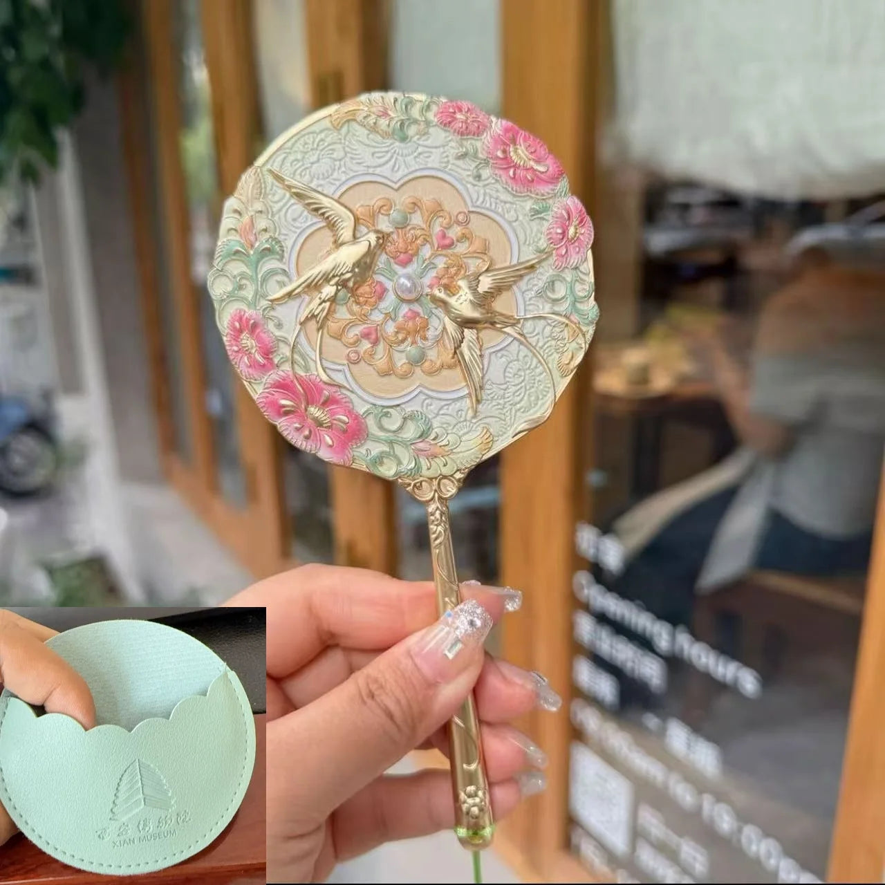 Handheld Relief Metal Mirror from Nanchang Tengwang Pavilion, a Chinese tourist souvenir