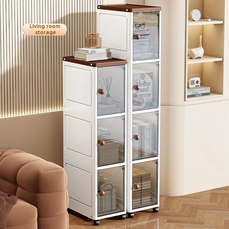 The transparent storage cabinet with wheels in the gap saves space in the kitchen and living room for storing snacks