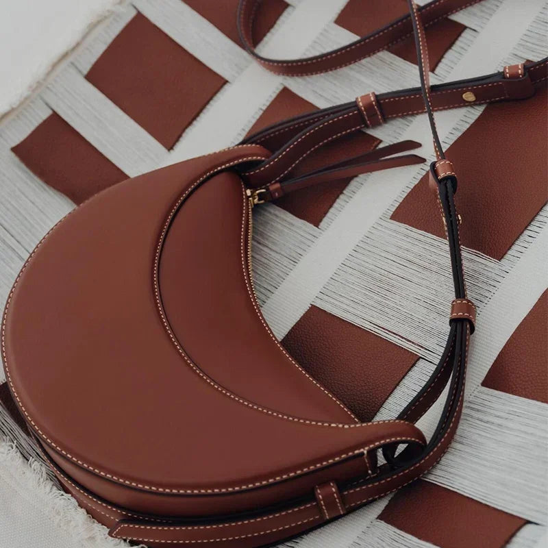 2025 French fashion genuine leather women's shoulder bag, crescent bag, niche design zipper closure shoulder crossbody bag