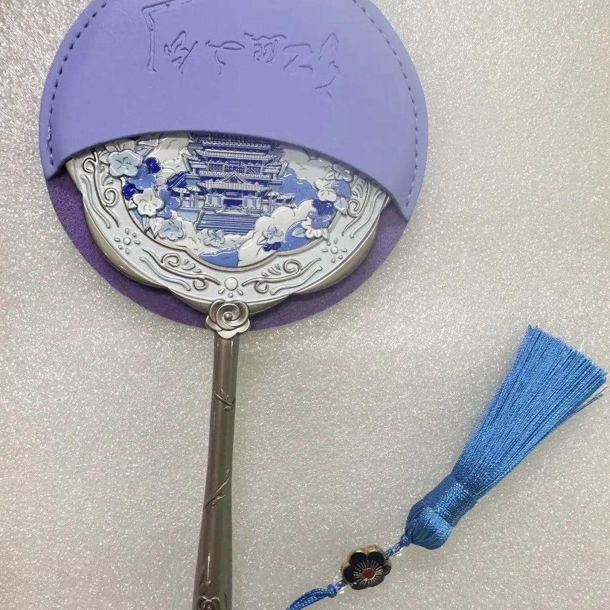 Handheld Relief Metal Mirror from Nanchang Tengwang Pavilion, a Chinese tourist souvenir