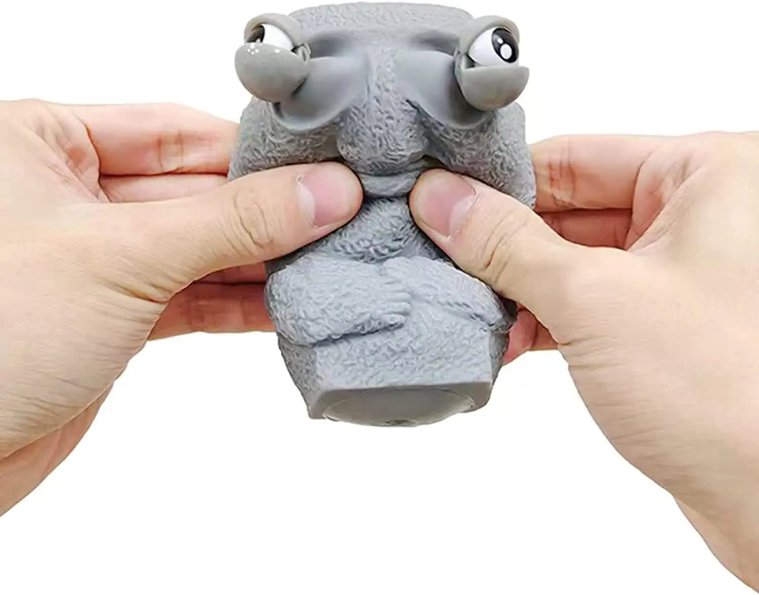 Stone man releases stress toy slowly rebounds soft Moai statue squeeze eyes interested expression relaxes stress children's gift