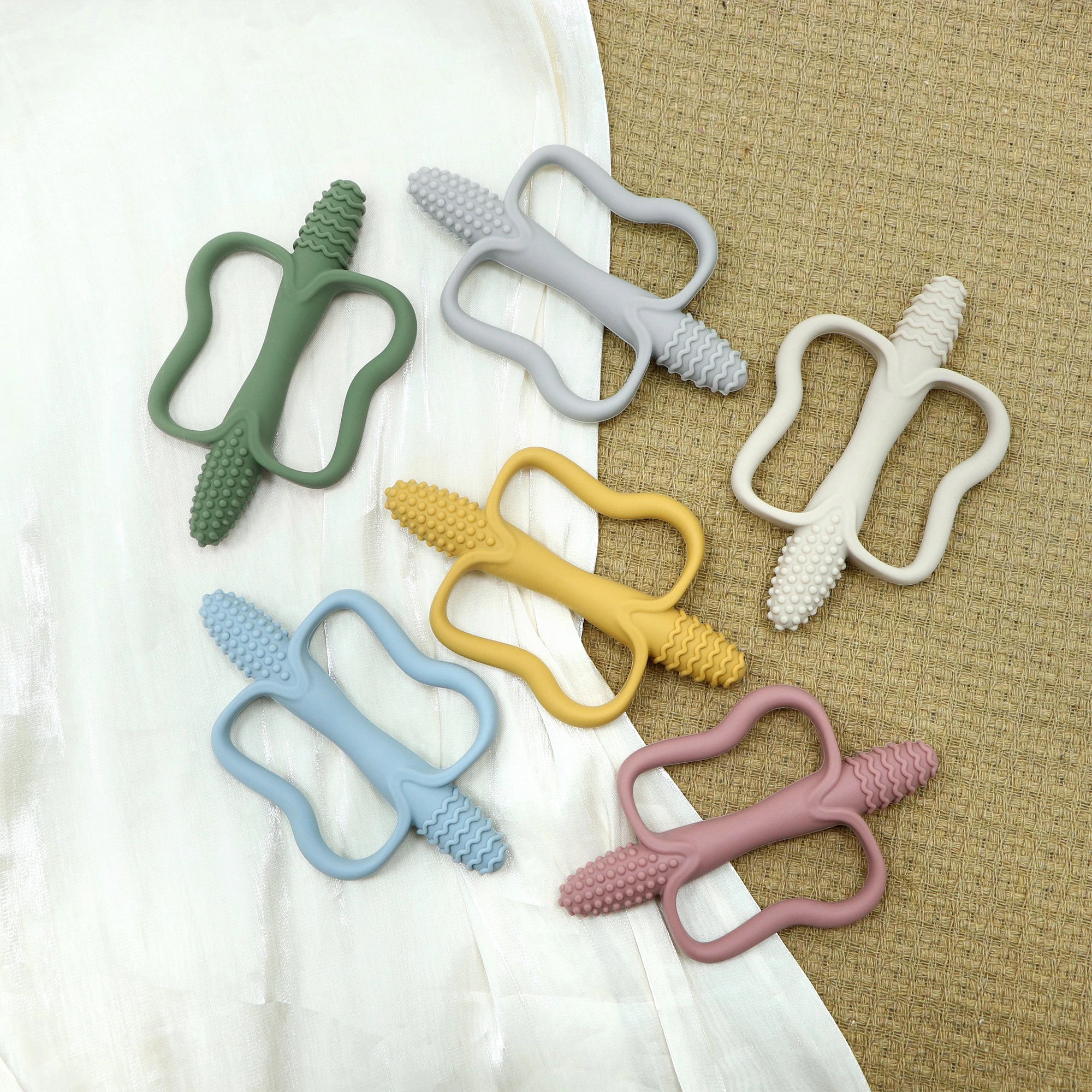 Integrated Silicone Teething Stick with Handle, Baby Toy Teether, Available in 6 Colors, Corn-Shaped Teether.
