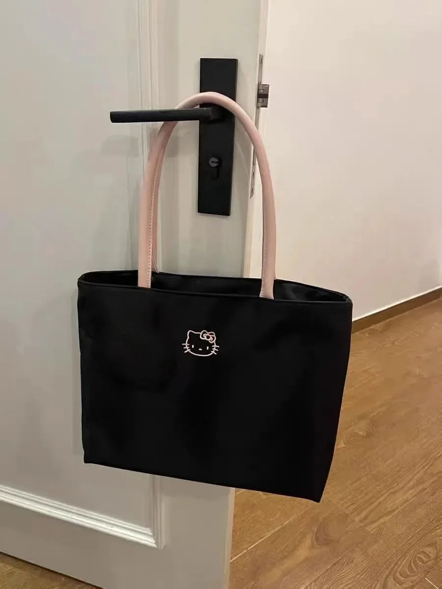 Cute cartoon embroidery large capacity shopping bag, fashionable and versatile shoulder bag, fashionable women's black handbag