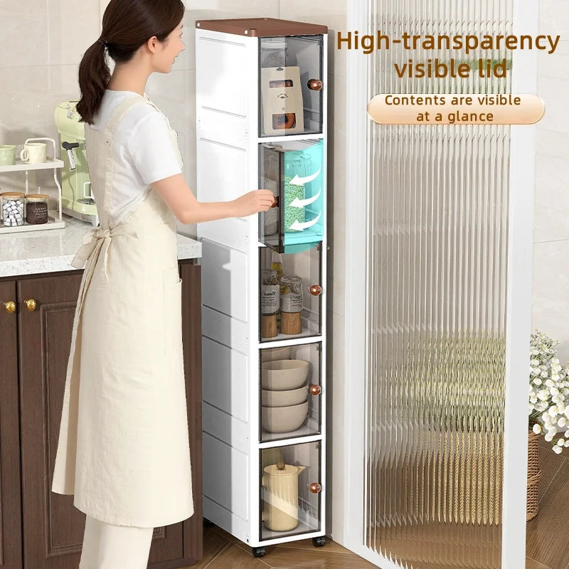 The transparent storage cabinet with wheels in the gap saves space in the kitchen and living room for storing snacks