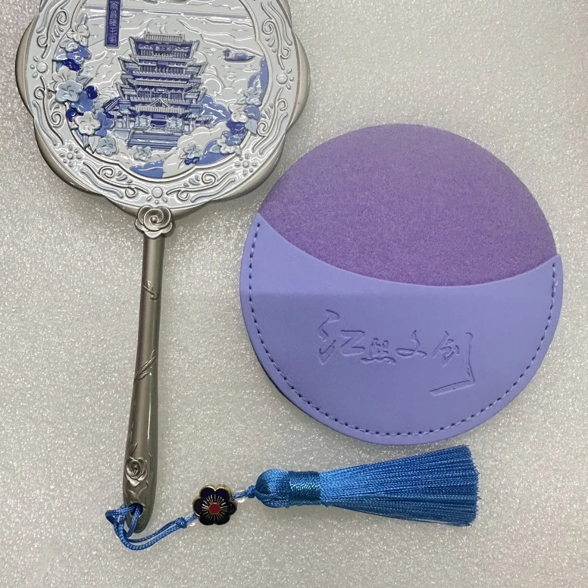 Handheld Relief Metal Mirror from Nanchang Tengwang Pavilion, a Chinese tourist souvenir