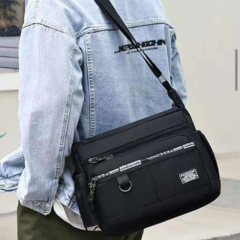 Men's cross-body bag with multi-layered pockets, adjustable shoulder strap, business single-shoulder bag