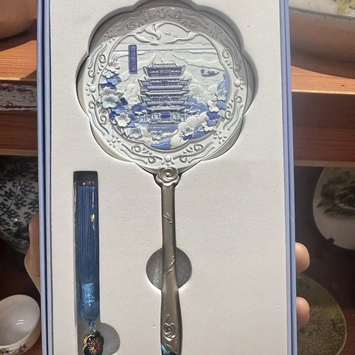 Handheld Relief Metal Mirror from Nanchang Tengwang Pavilion, a Chinese tourist souvenir