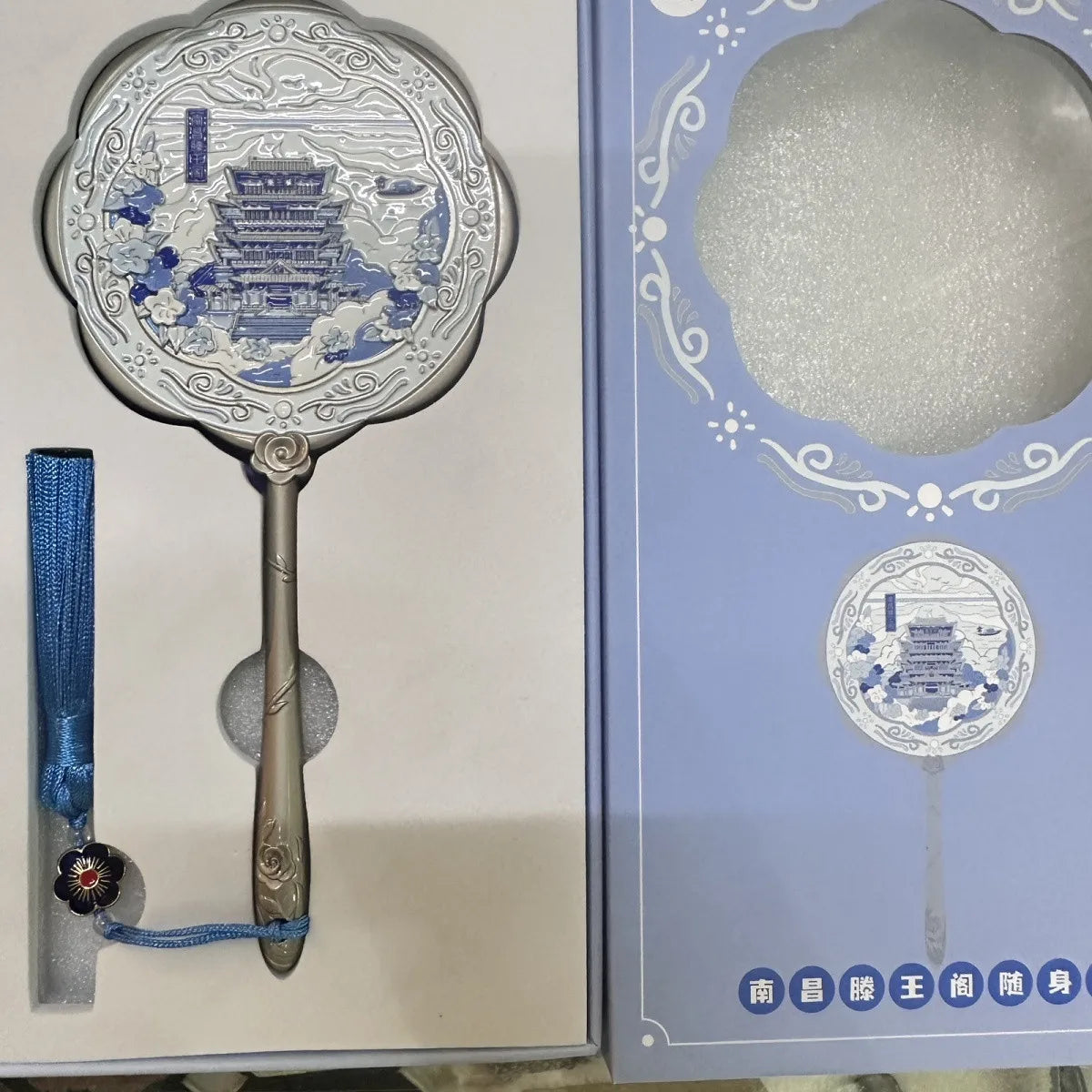 Handheld Relief Metal Mirror from Nanchang Tengwang Pavilion, a Chinese tourist souvenir