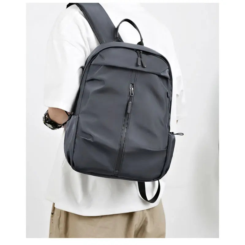 Lightweight and waterproof backpack for men, large capacity student backpack, new business and leisure computer bag, travel back