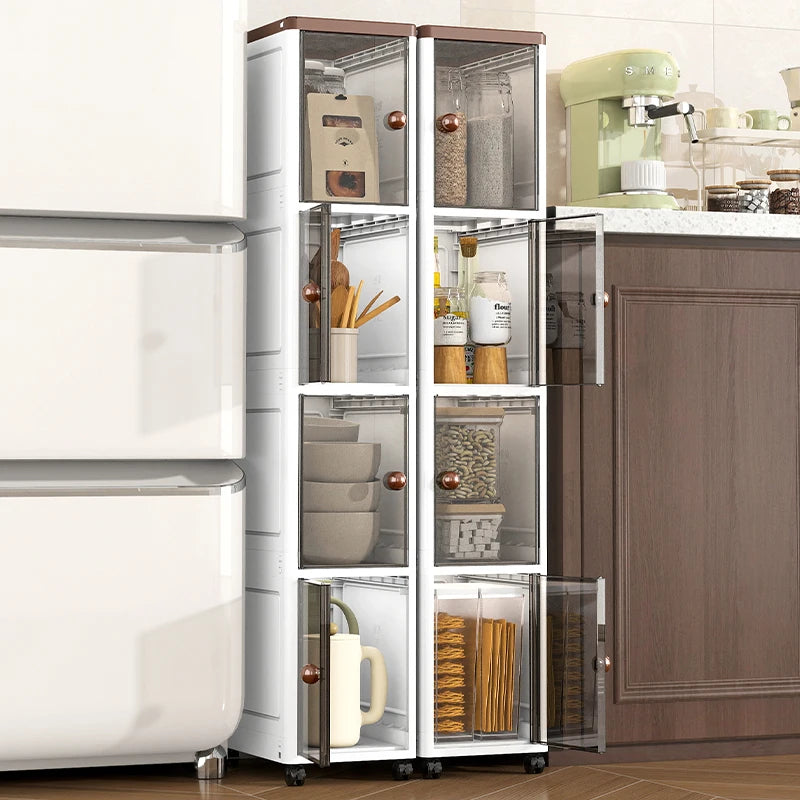 The transparent storage cabinet with wheels in the gap saves space in the kitchen and living room for storing snacks