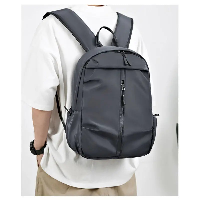 Lightweight and waterproof backpack for men, large capacity student backpack, new business and leisure computer bag, travel back
