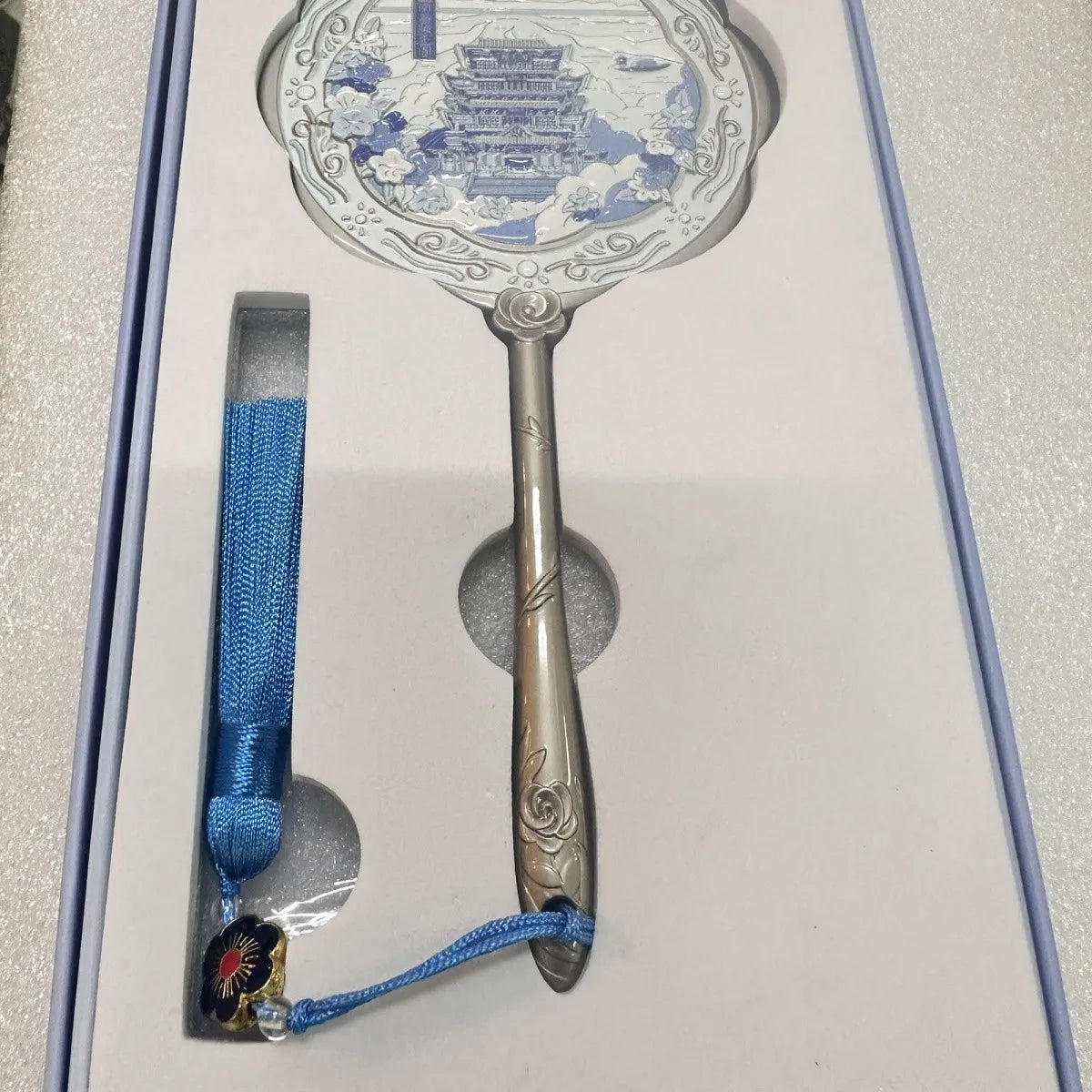 Handheld Relief Metal Mirror from Nanchang Tengwang Pavilion, a Chinese tourist souvenir